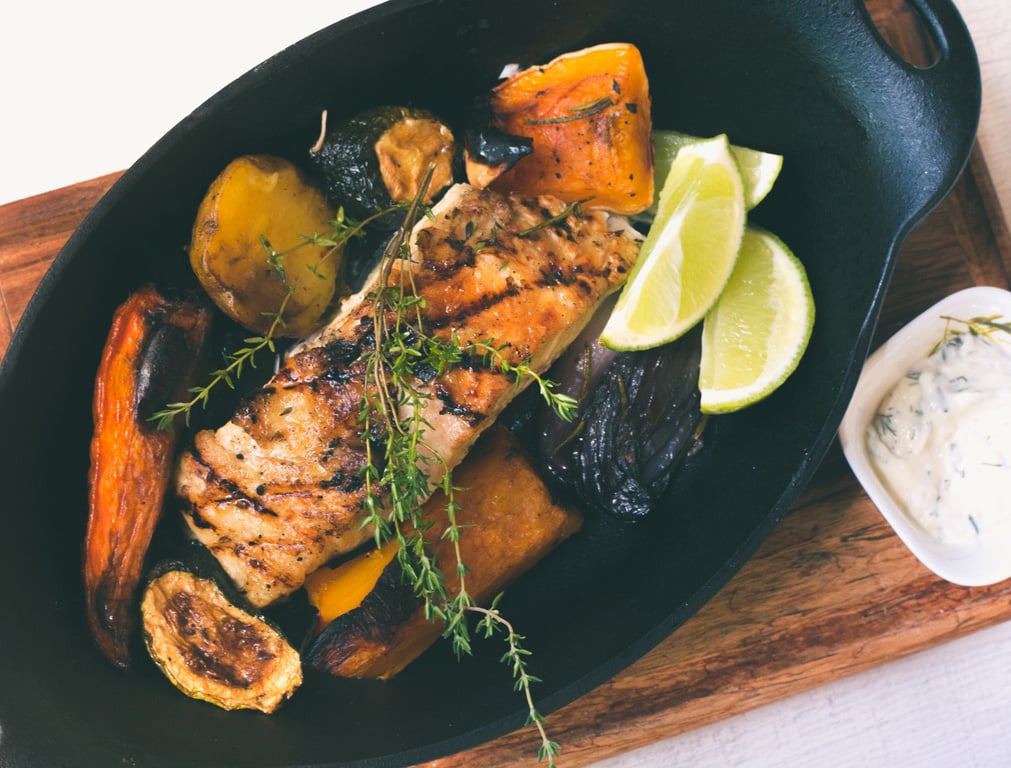 Grilled Meat on Black Sizzling Tray